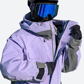 A person wearing a Powster purple ski jacket